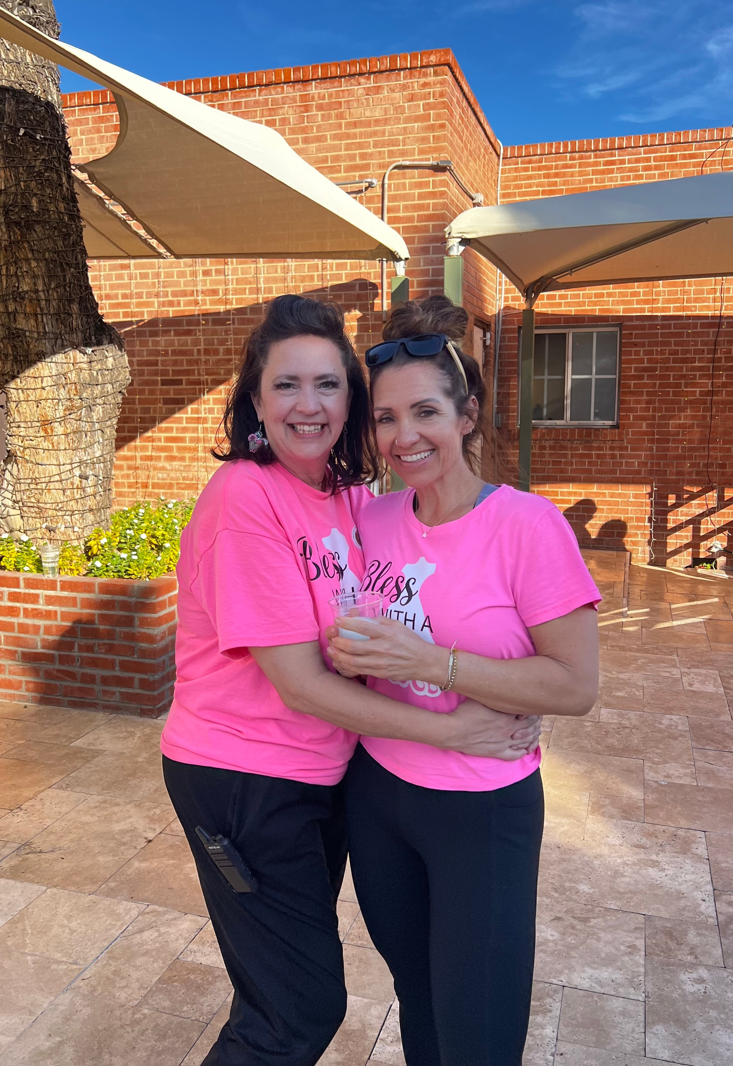Community volunteers helping with dress donations